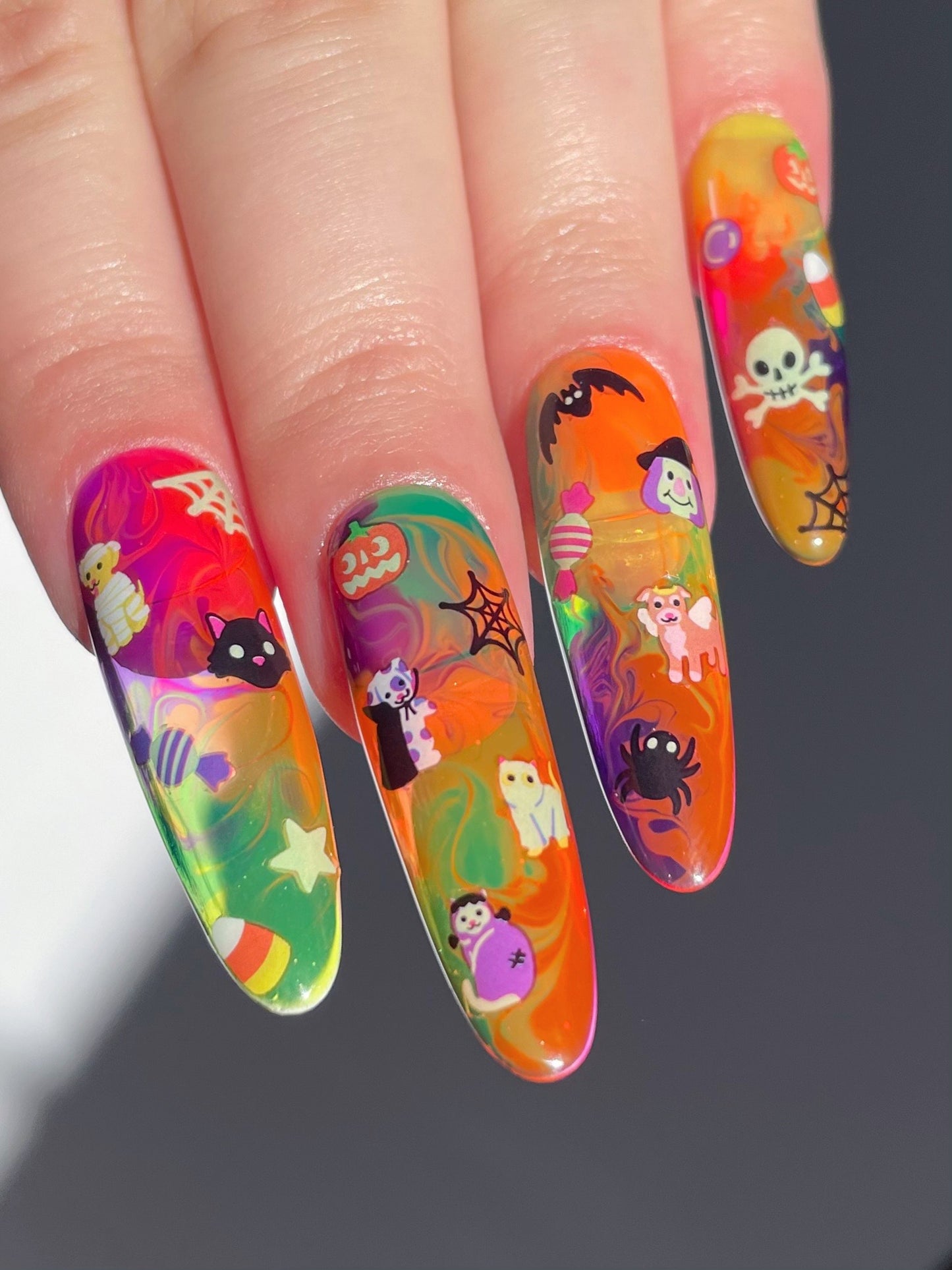 Long colorful nails with stickers on