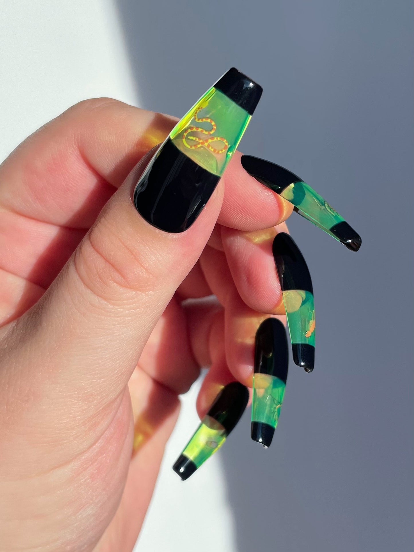 Bug nails in glowing green glass, nail art