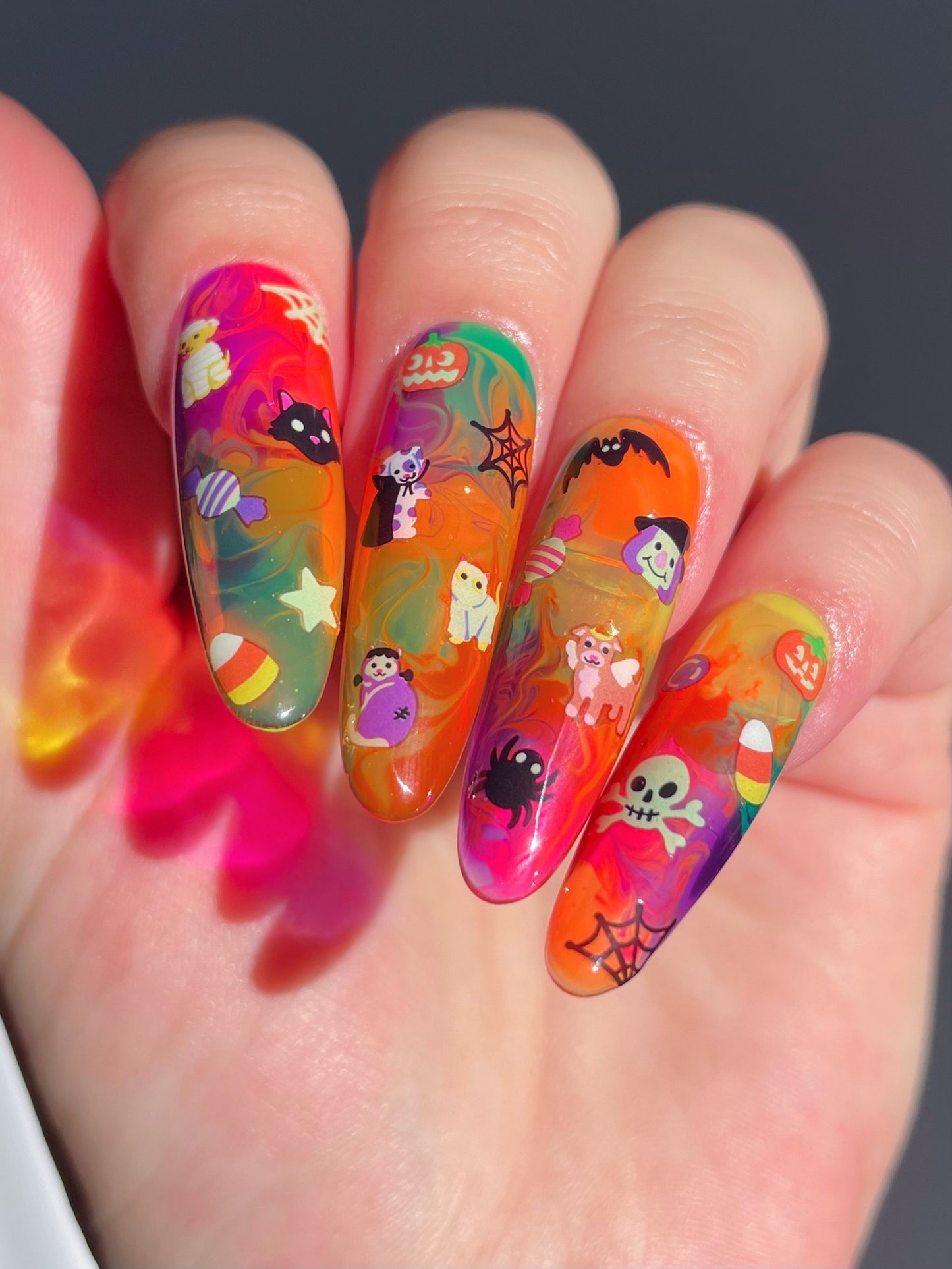 Long colorful nails with stickers on