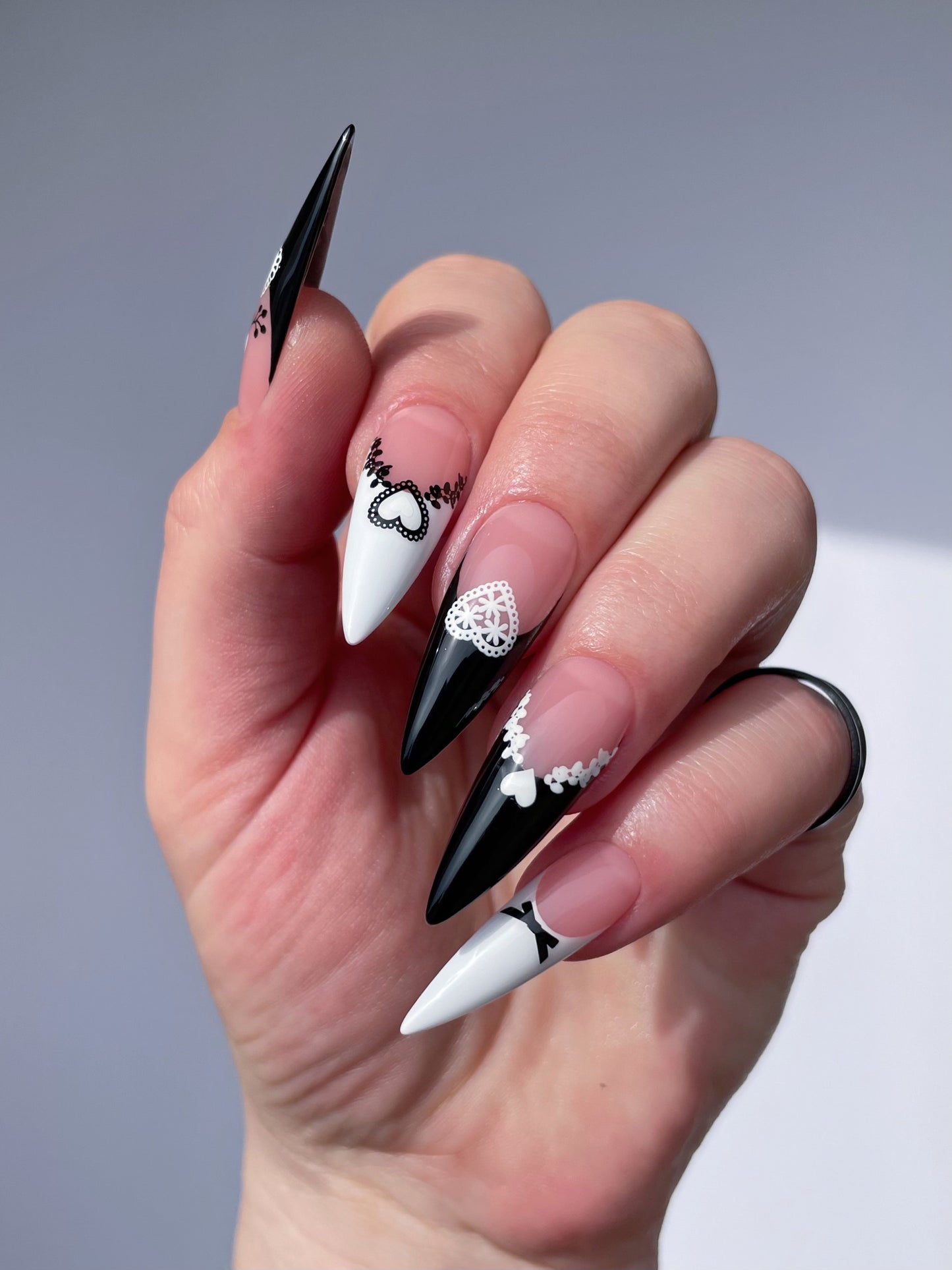 long stiletto nails with black and white french and black and white lace nail art stickers