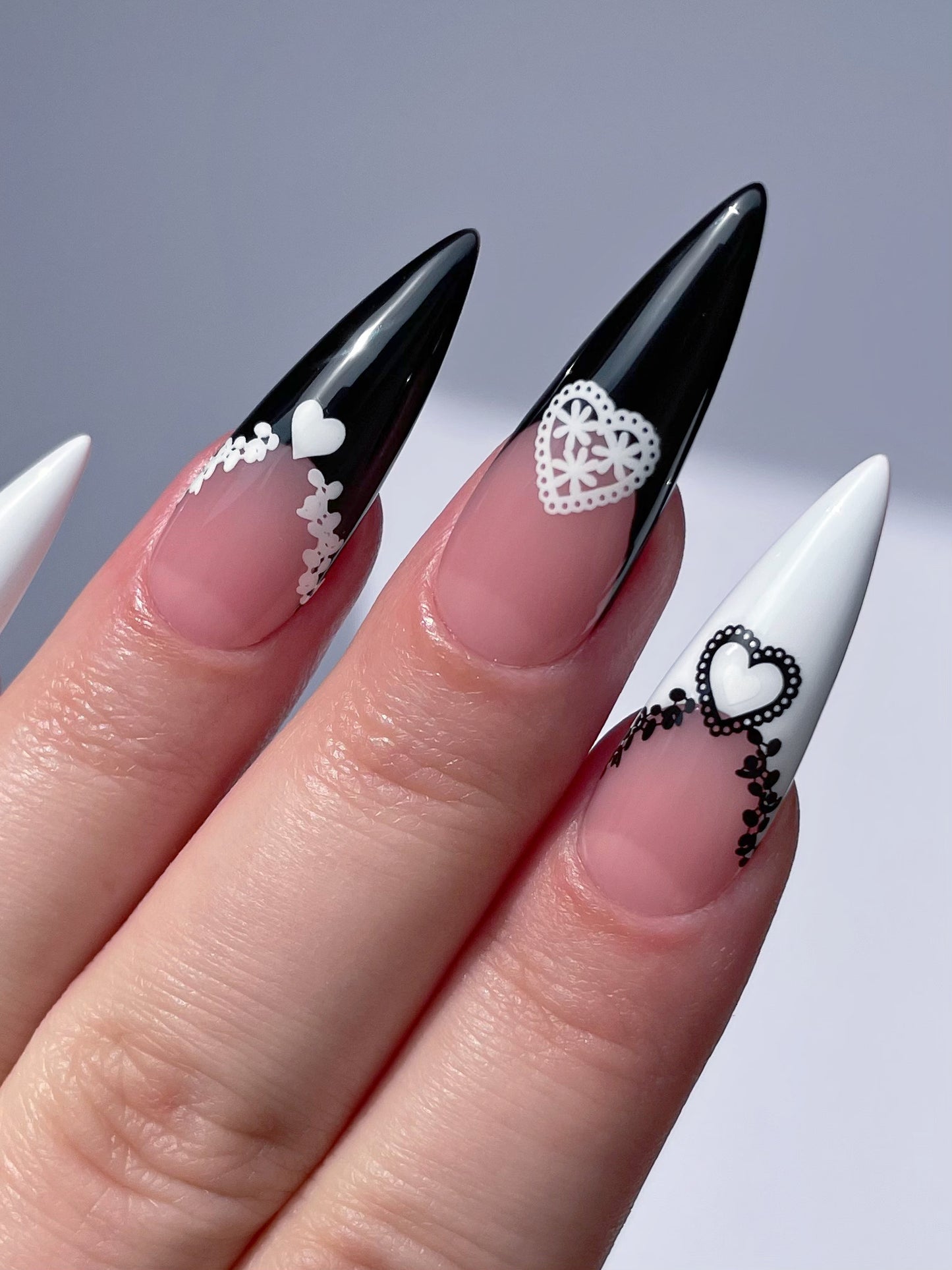 long stiletto nails with black and white french and black and white lace nail art stickers