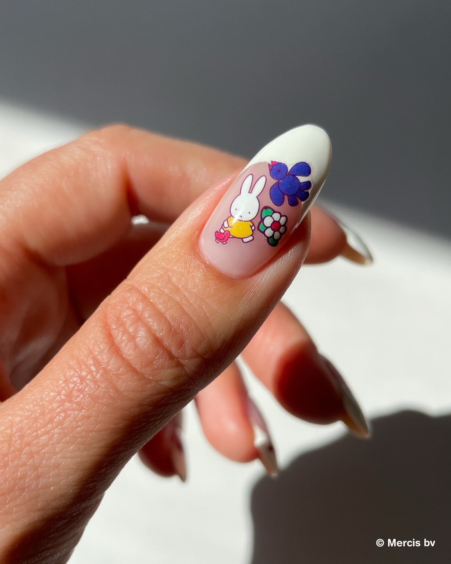 Nail with french tip and miffy nail art stickers