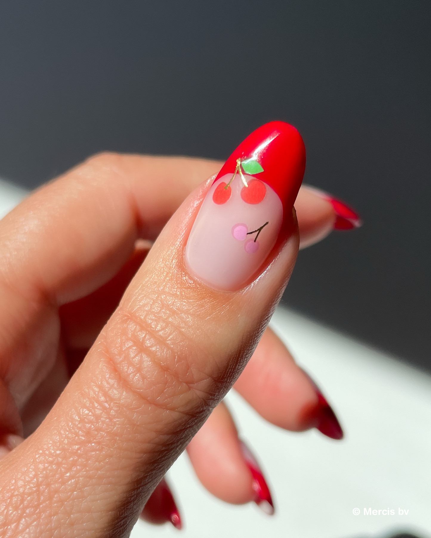 Nail with red french tip and miffy nail art stickers