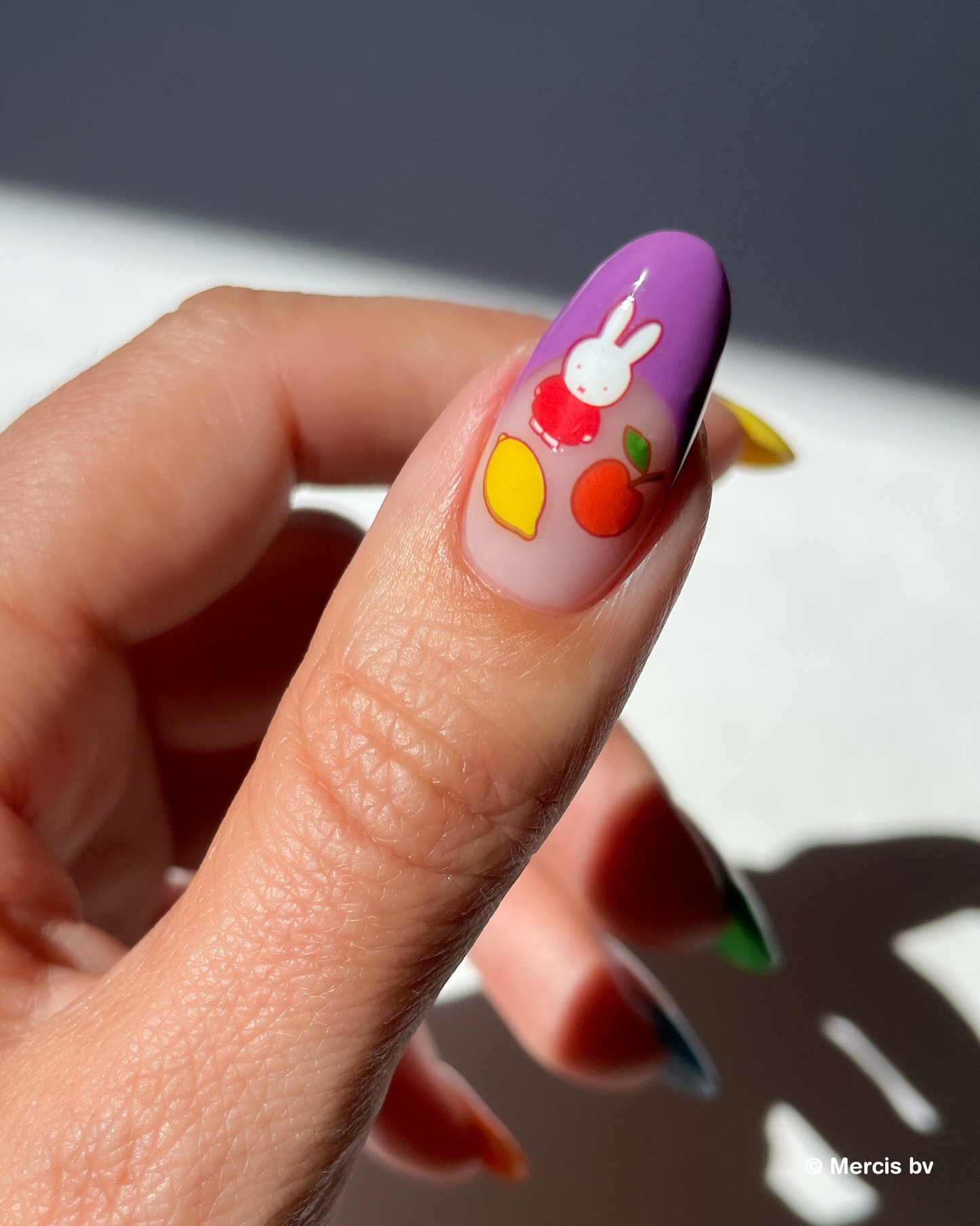Nail with purple french tip and miffy nail art stickers