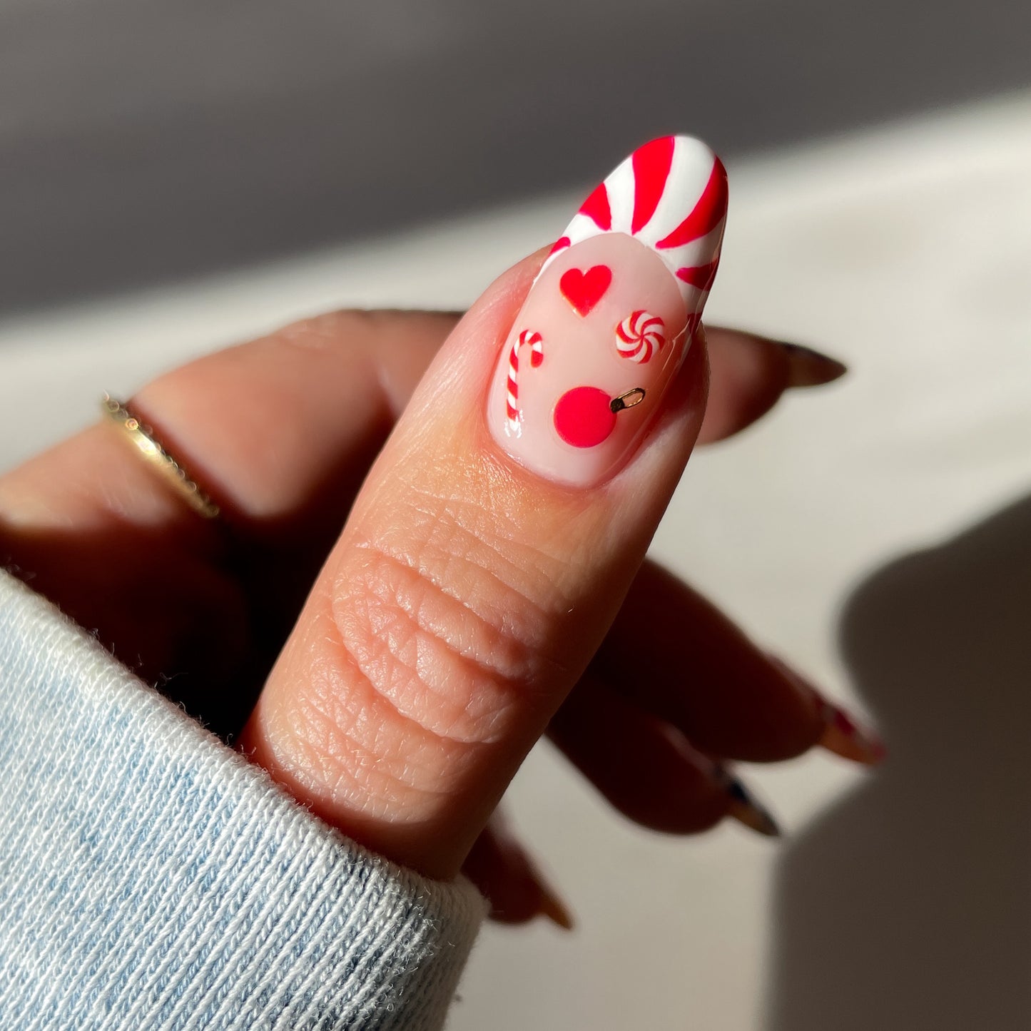 Candy cane french tips with Wonderland stickers