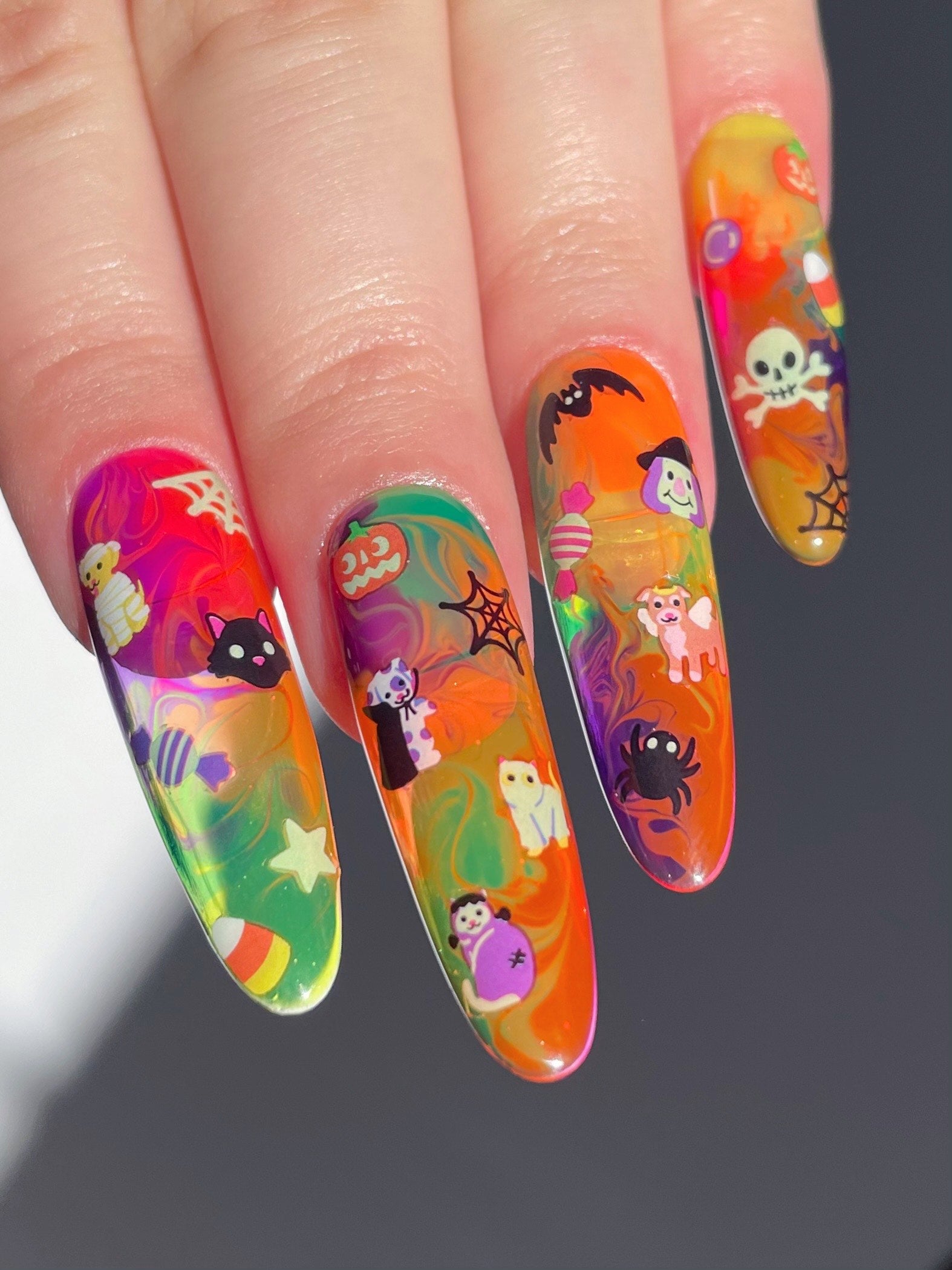 Long colorful nails with stickers on