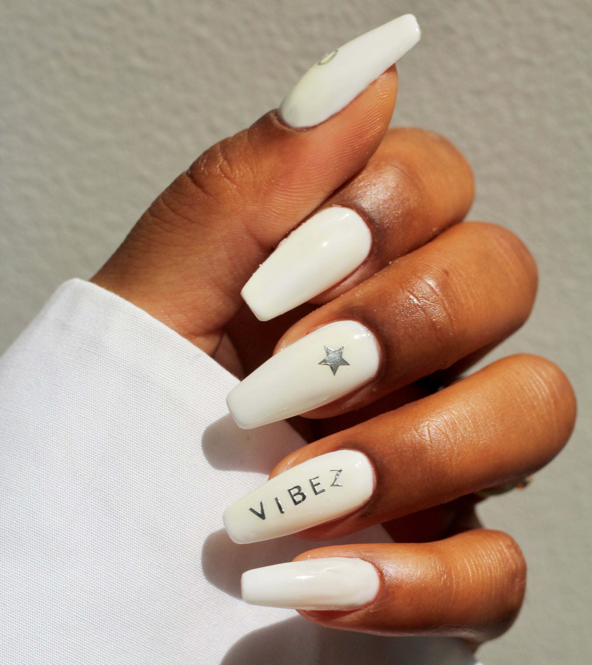 ABCS on cream nails, VIBEZ