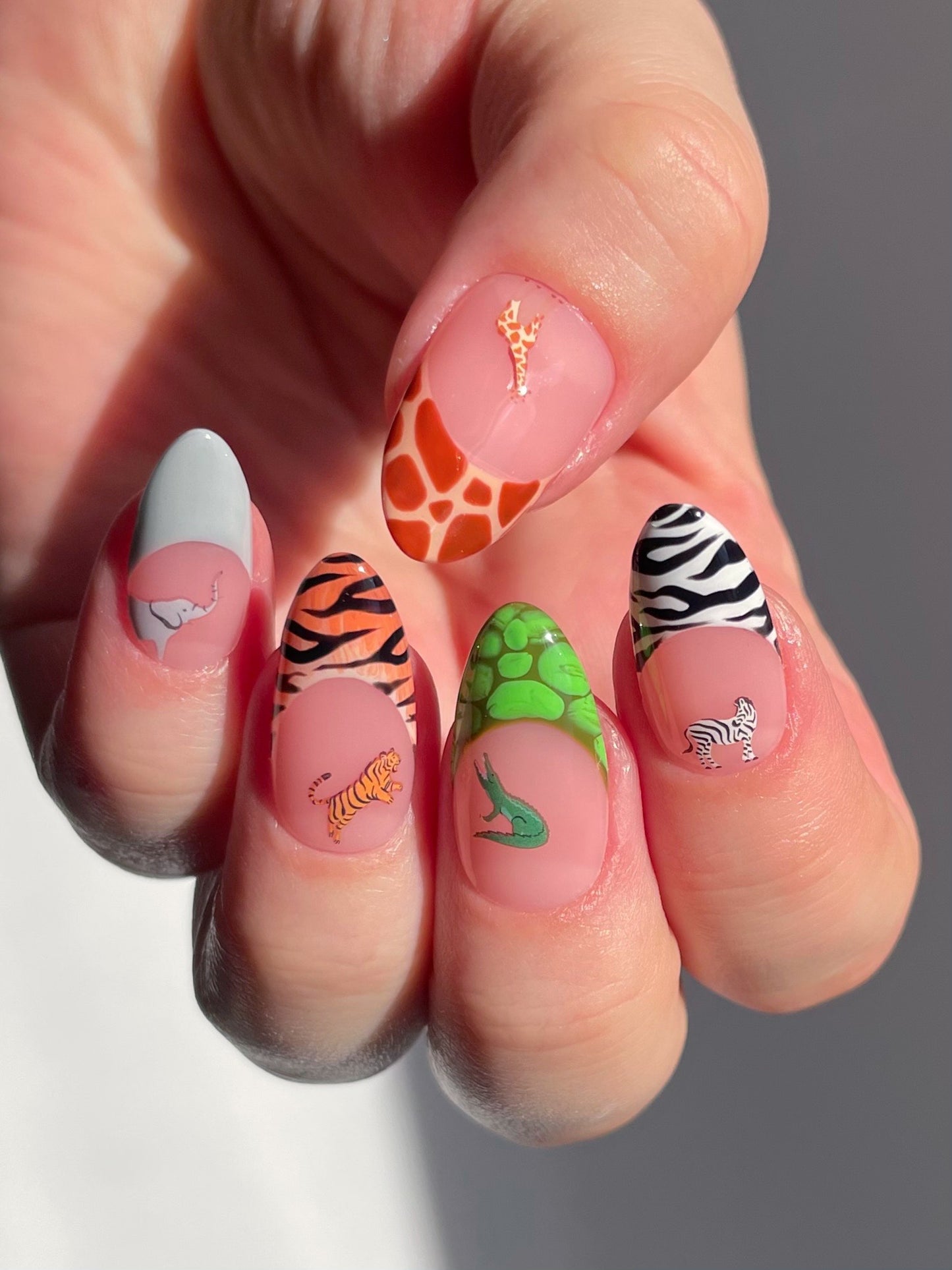 Safari look with animal print french tips