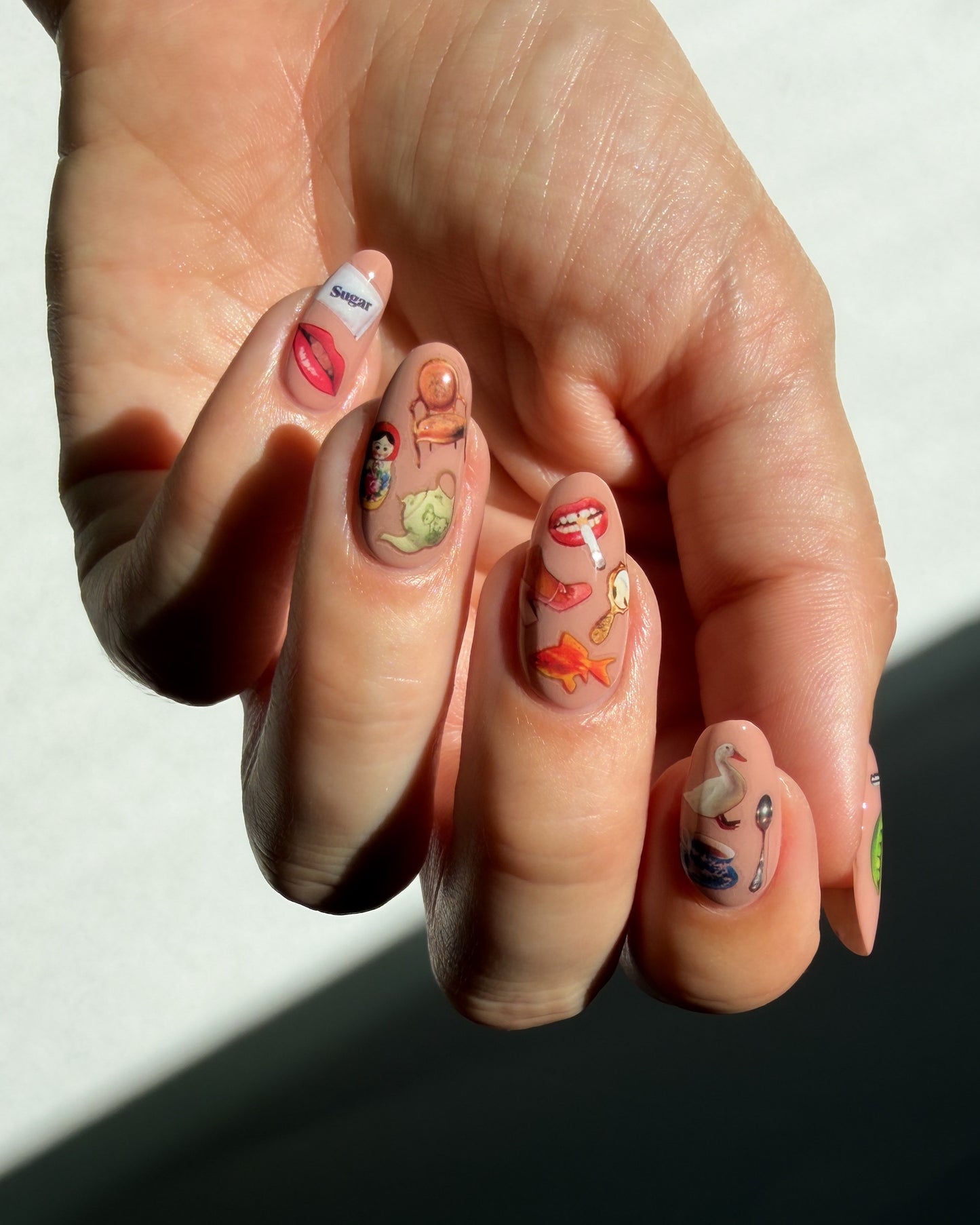 Nail art stickers on nude nails
