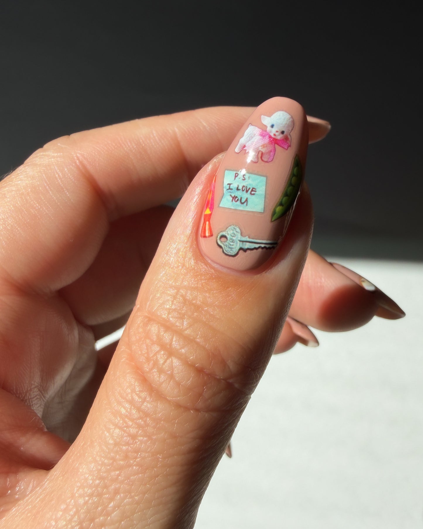 Nail art stickers on nude nails