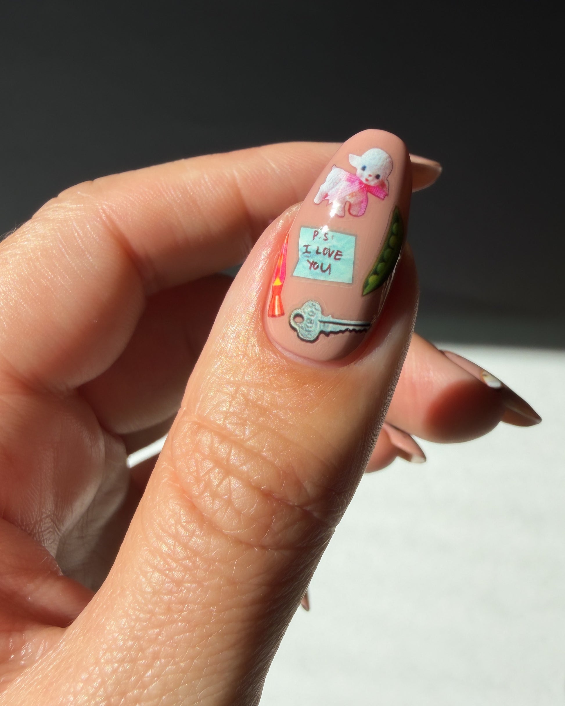 Nail art stickers on nude nails