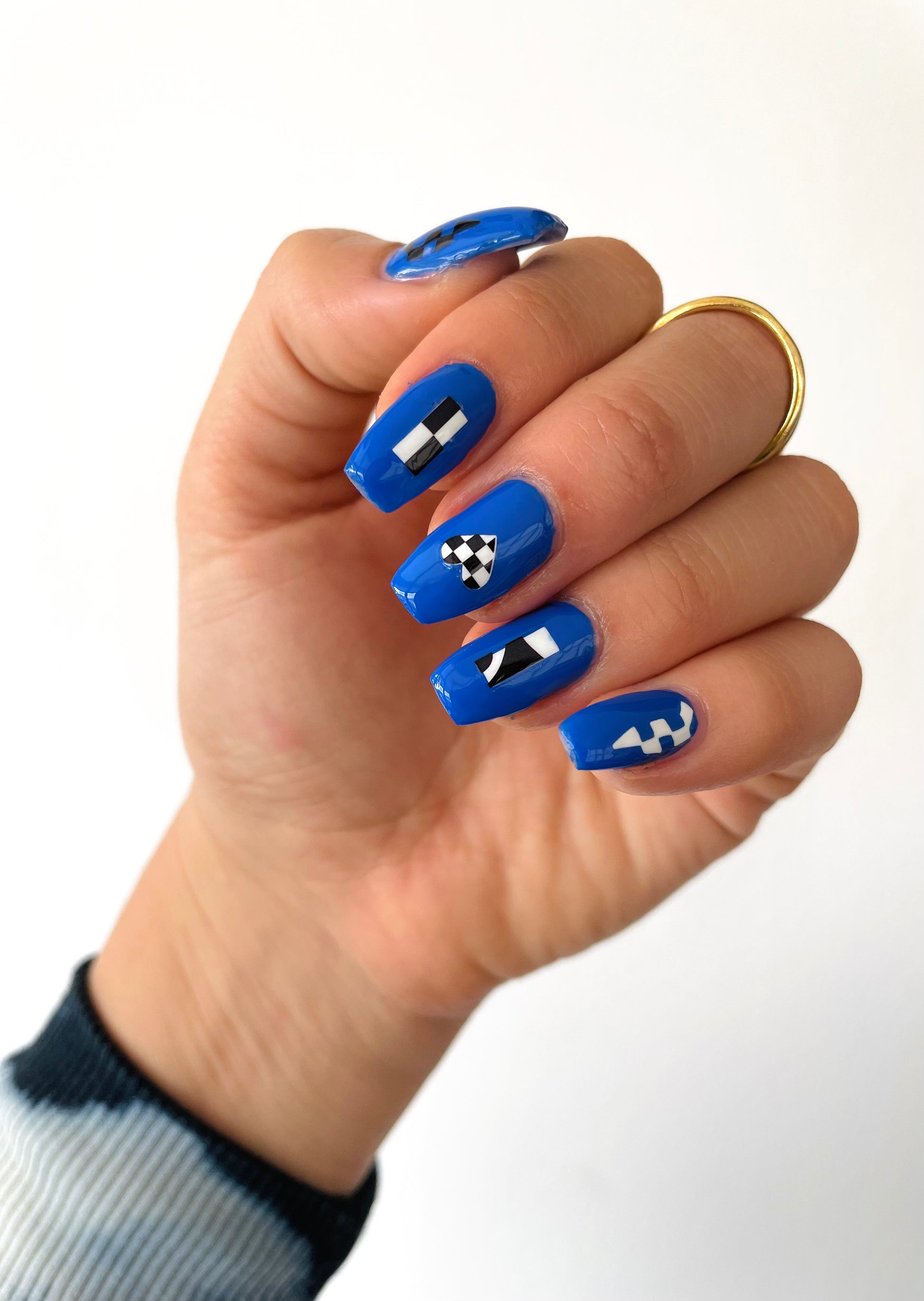 Mod stickers on blue nails