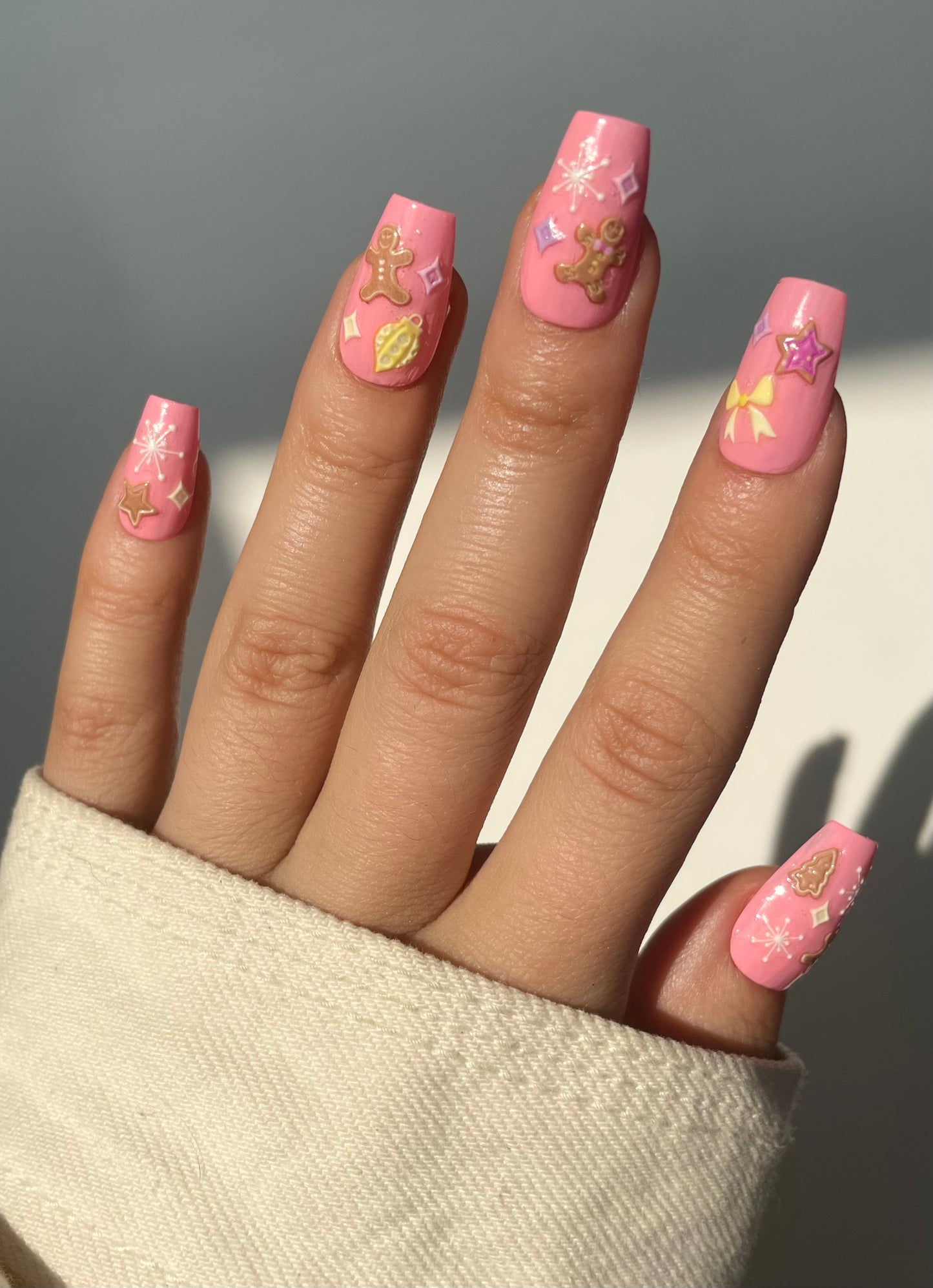 Pink nails with Gingerbread stickers