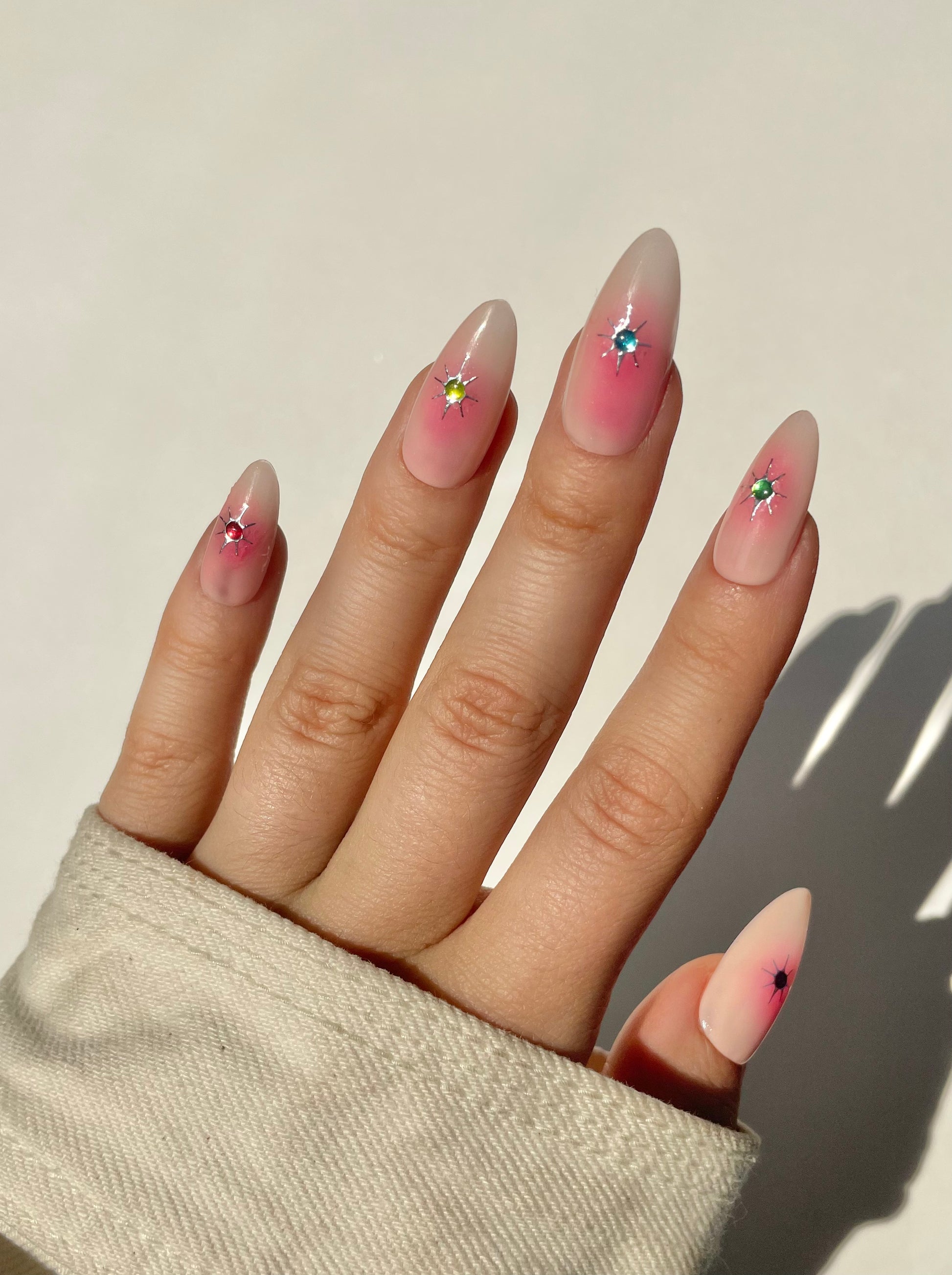Sparkle Nail art stickers on pink nails