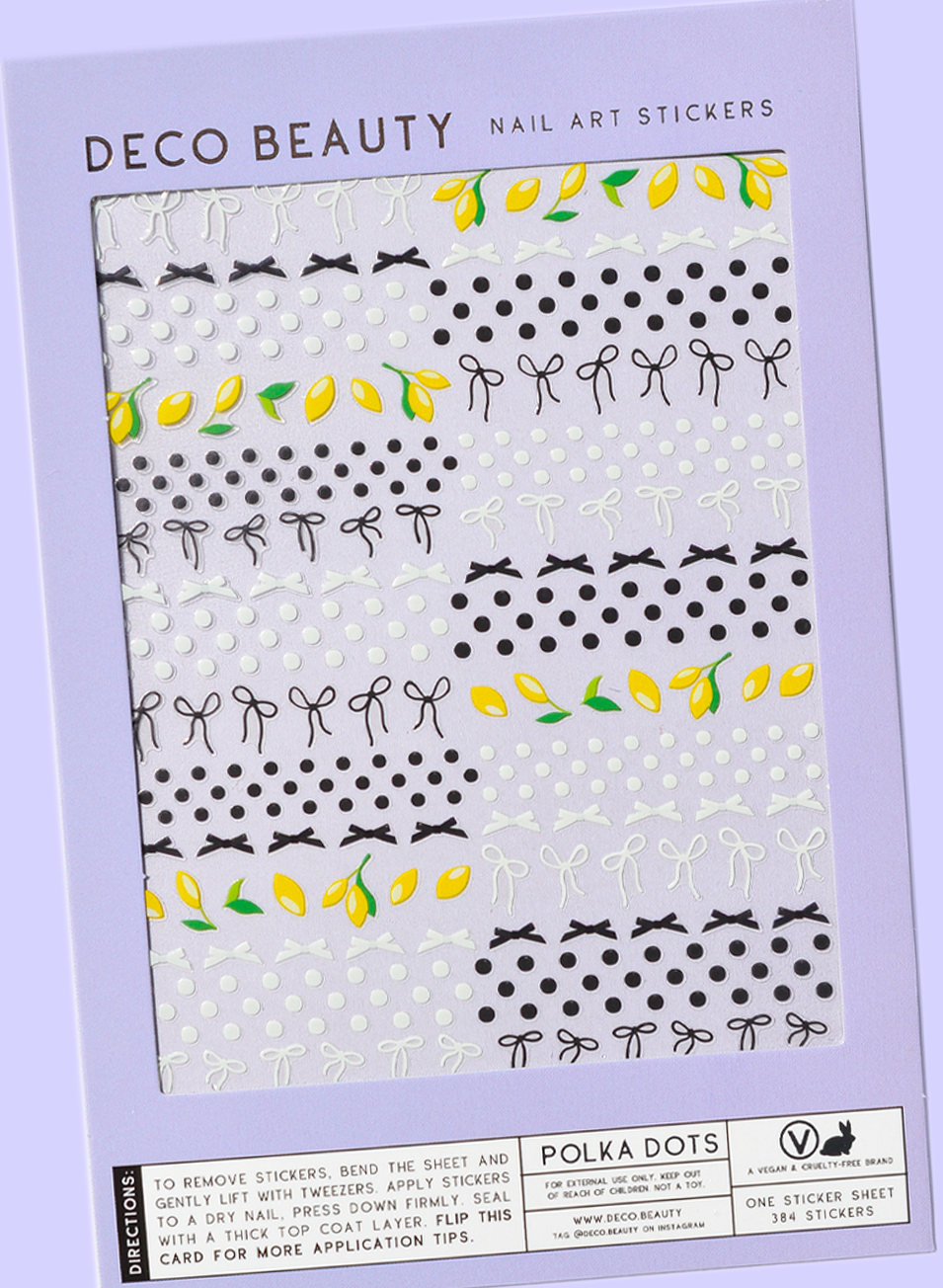 Polka Dots sheet flat lay slanted on purple background