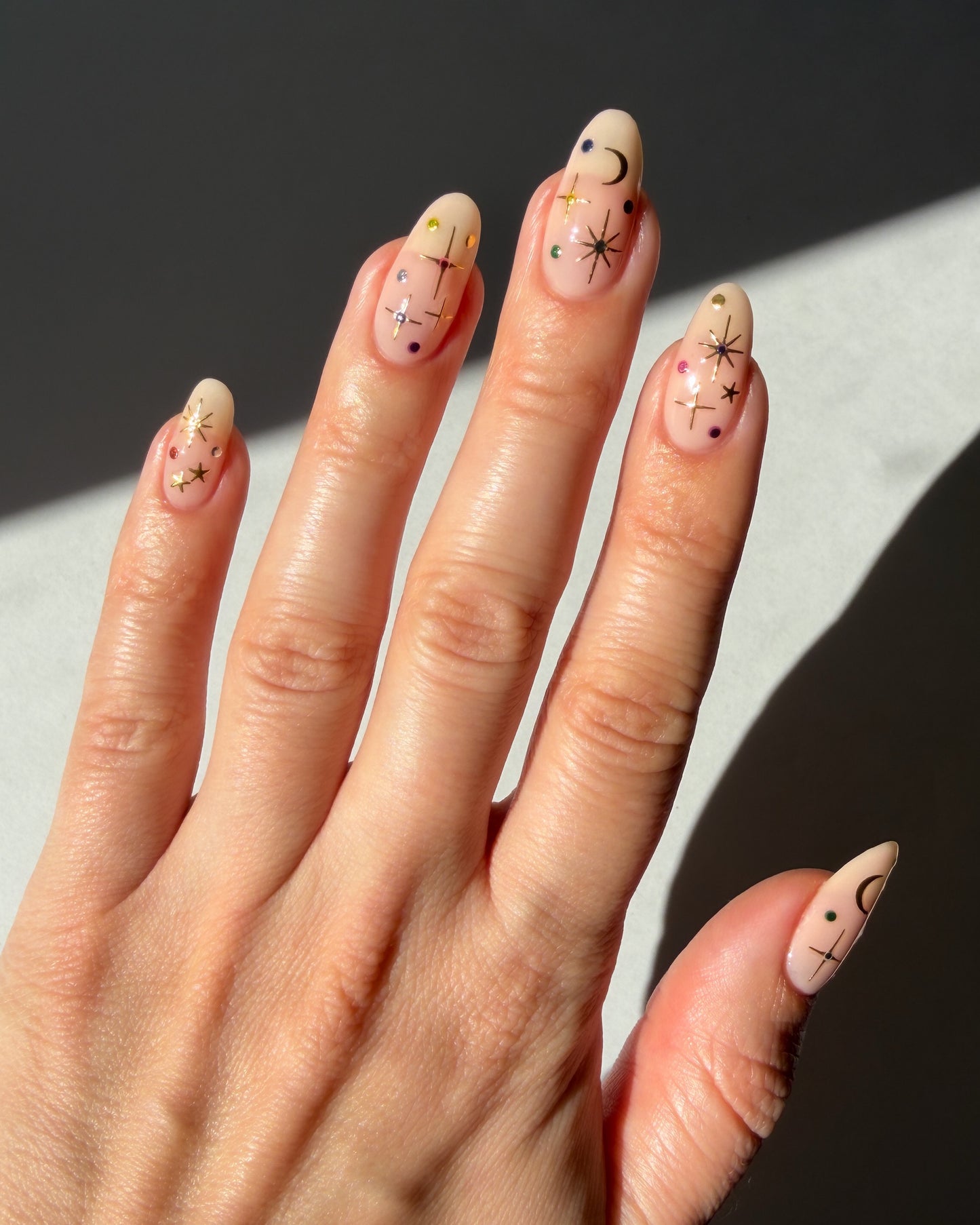 Stardust stickers on nude nails