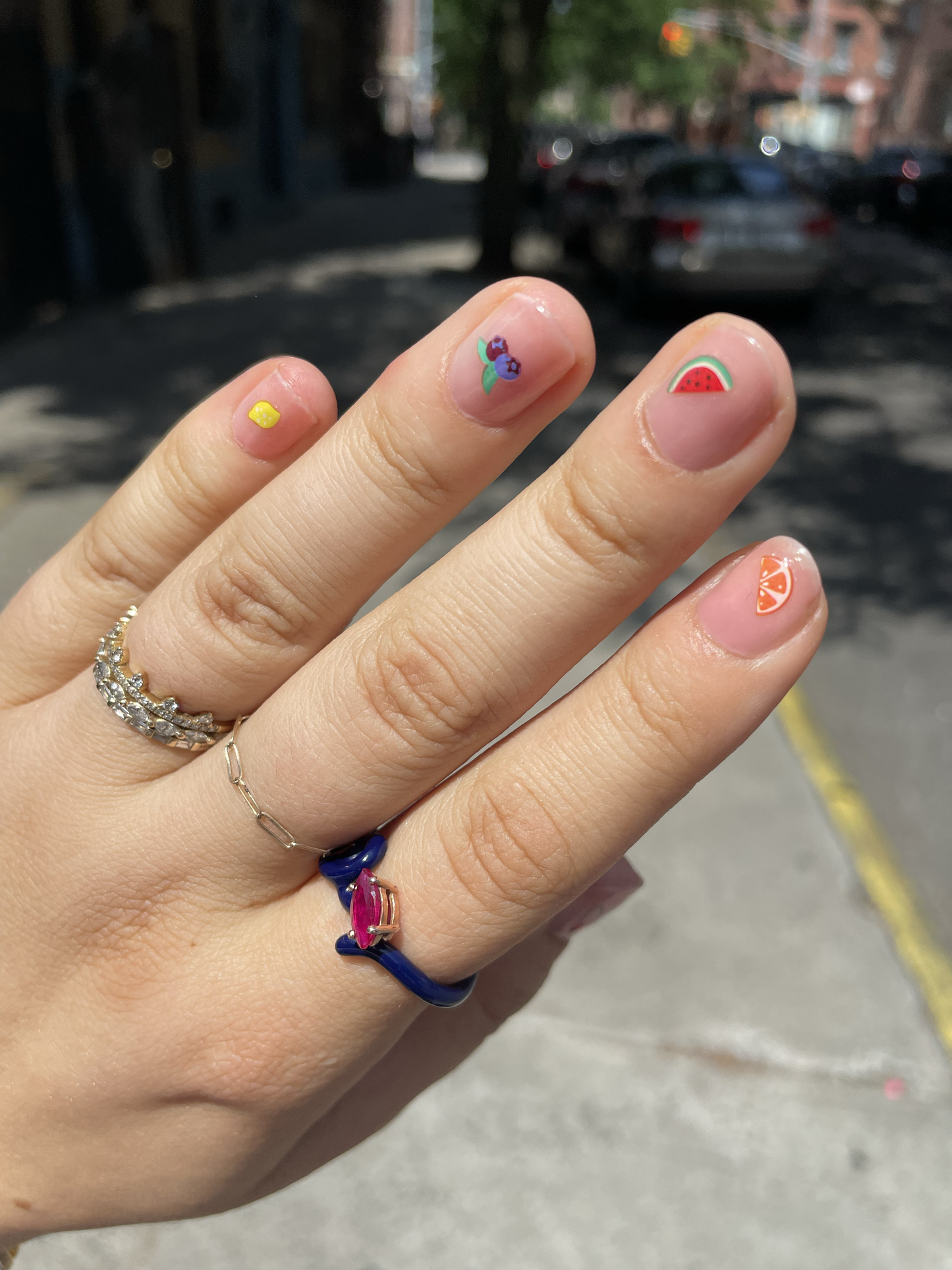 Fruit salad stickers on short nails