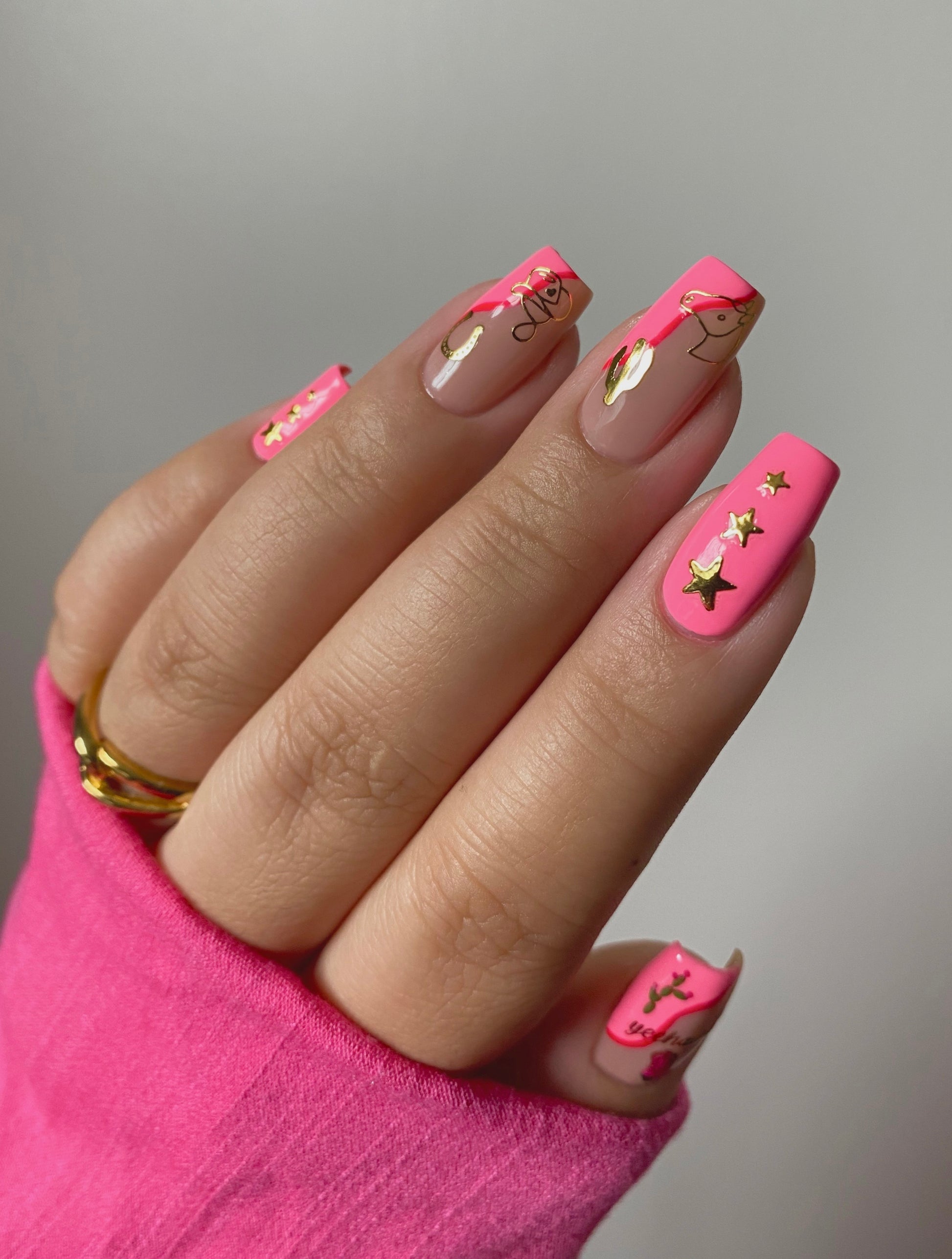 Image of Howdy stickers on pink nails
