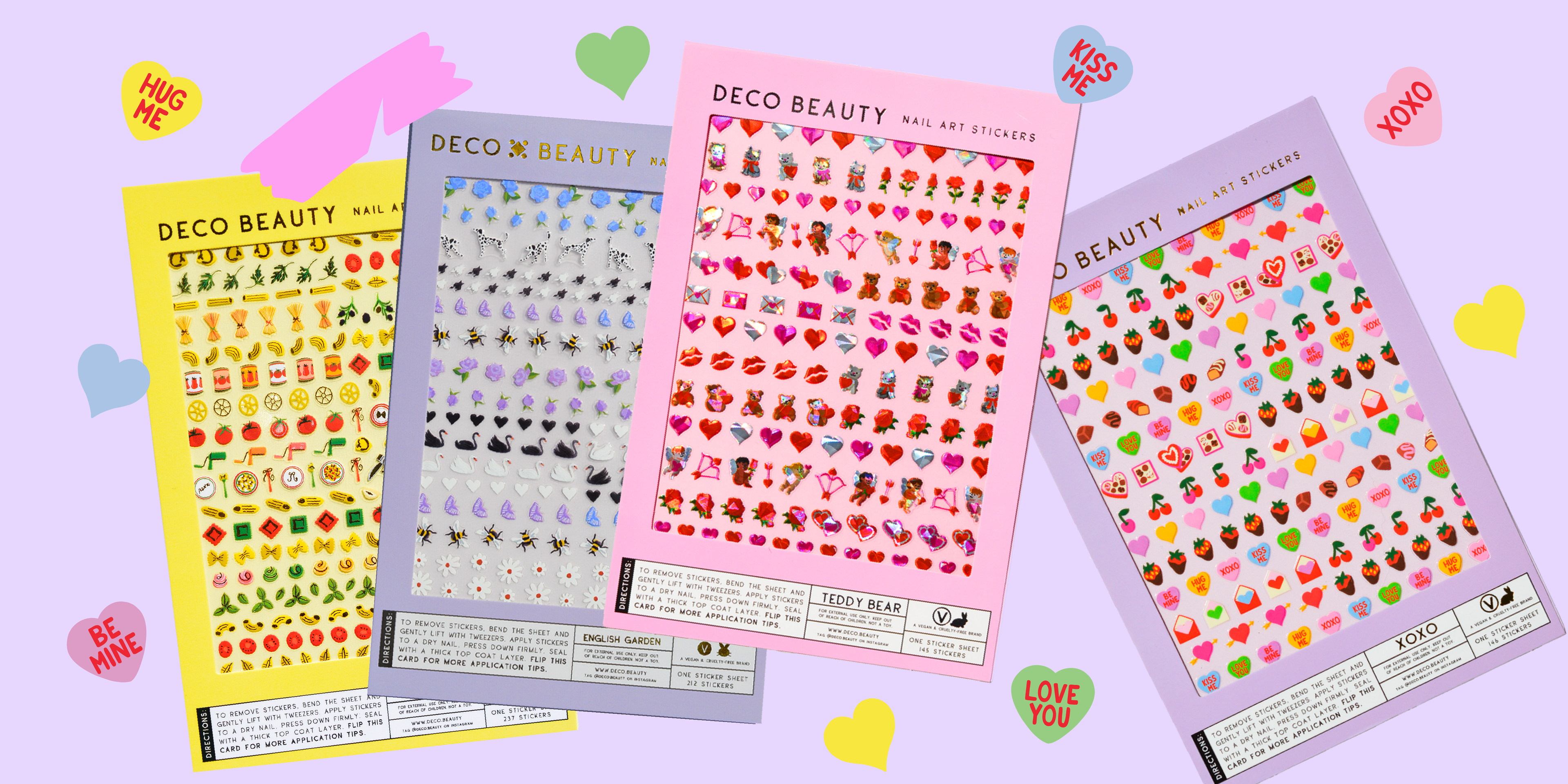 Valentine's Day hero banner featuring sticker sheets (Pasta, butterflies and hearts, and new holographic stickers) on a purple banner with little candy heart graphics.